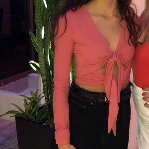 Pink long sleeve cut out crop top